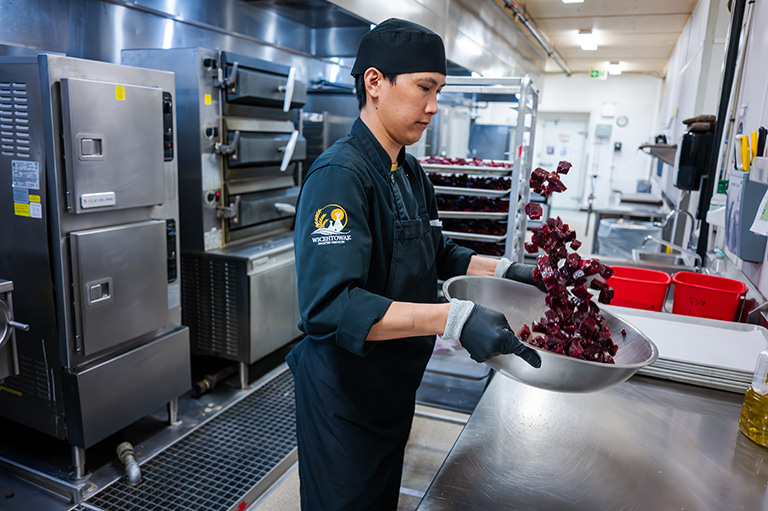 Cook tossing beets